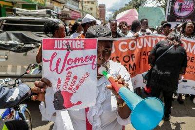 Activists Holding Placards Chant Slogans As They Demonstrate